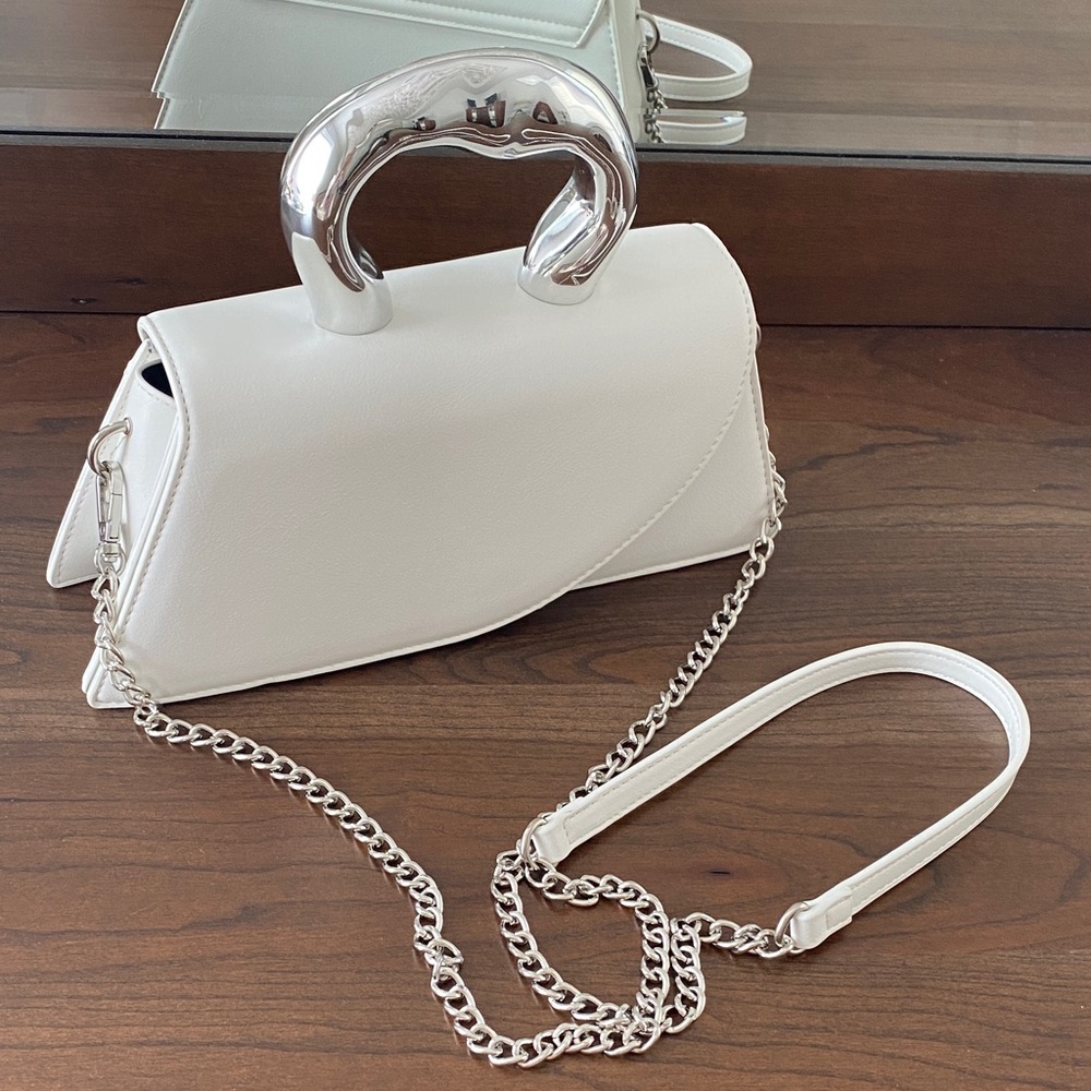 Elegant White Handbag with Silver Metal like handle